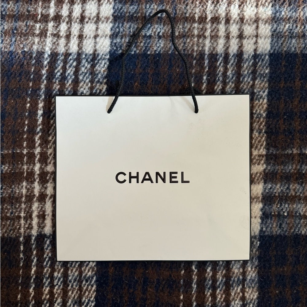 Black and white Chanel shopping bag